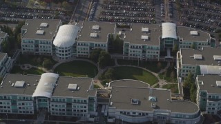 JDC04_016 - 5K aerial stock footage of tilting from homes  to reveal Apple Headquarters office buildings, Cupertino, California