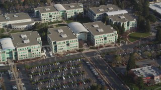 JDC04_018 - 5K stock footage aerial video of flying away from Infinite Loop 1 office building at Apple Headquarters, Cupertino, California