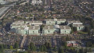 JDC04_019 - 5K aerial stock footage of flying away from Apple Headquarters office buildings, Cupertino, California