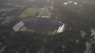 JDC04_024 - 5K aerial stock footage tilt from Stanford Stadium, reveal Stanford University and Hoover Tower, Stanford, California