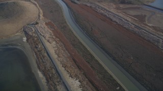 JDC04_038 - 5K aerial stock footage of flying away from marshland, Union City, California