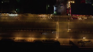 LD01_0002 - 5K aerial stock footage of streets and apartments at night in Hawthorne, California