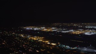 LD01_0005 - 5K aerial stock footage passenger jet take off at night from LAX (Los Angeles International Airport), California