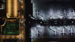 LD01_0014 - 5K aerial stock footage a bird's eye of LAX (Los Angeles International Airport), California at night