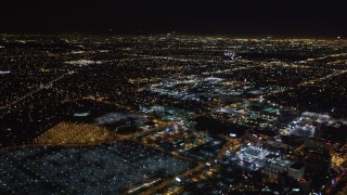 LD01_0016 - 5K aerial stock footage track a passenger jet landing at night, LAX (Los Angeles International Airport), California