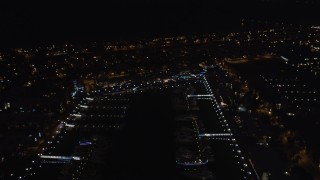 LD01_0021 - 5K aerial stock footage fly over marina toward homes at night, Marina Del Rey, California