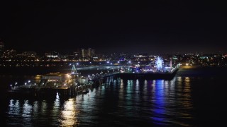 LD01_0027 - 5K aerial stock footage an orbit of Santa Monica Pier, California at nighttime
