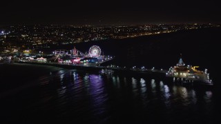 LD01_0028 - 5K aerial stock footage of the Santa Monica Pier, California at night