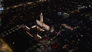 LD01_0052 - 5K aerial stock footage video of an orbit of Los Angeles California Temple, Westwood, California, at night