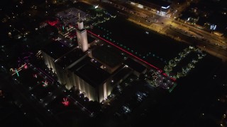 LD01_0053 - 5K aerial stock footage video circling the Los Angeles California Temple, Westwood, California, at night
