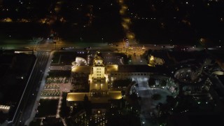 LD01_0059 - 5K aerial stock footage orbit Beverly Hills Police Department at night, California