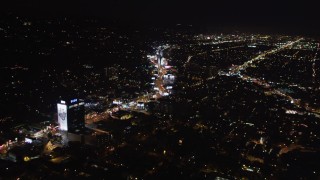 LD01_0061 - 5K aerial stock footage of approaching Sunset Strip at night in West Hollywood, California