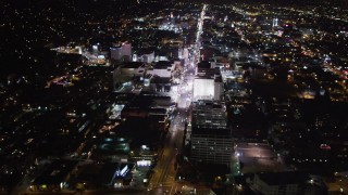 LD01_0069 - 5K aerial stock footage approach Hollywood Boulevard at night in Hollywood, California