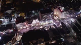 LD01_0071 - 5K aerial stock footage flyby hotels and theaters at night in Hollywood, California