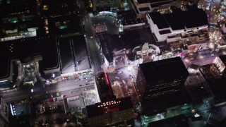 LD01_0073 - 5K stock footage aerial video of Grauman's Chinese and Kodak Theaters at night in Hollywood, California