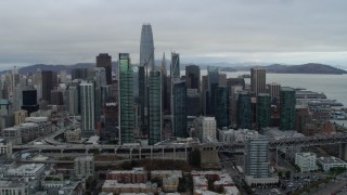 PP0002_000010 - 5.7K stock footage aerial video reverse view of skyscrapers in city's skyline, Downtown San Francisco, California