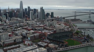 PP0002_000015 - 5.7K stock footage aerial video flying by AT&T Park, with city skyline in background, Downtown San Francisco, California