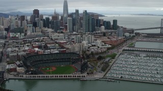 PP0002_000017 - 5.7K stock footage aerial video flying away from AT&T Park, with city skyline in background, Downtown San Francisco, California
