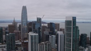 PP0002_000025 - 5.7K stock footage aerial video pan from Bay Bridge to reveal skyscrapers in Downtown San Francisco, California