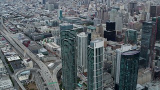 PP0002_000044 - 5.7K stock footage aerial video tilt from Bay Bridge to reveal skyscrapers and the expanse of the city, Downtown San Francisco, California