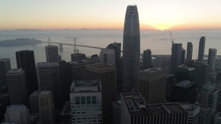 PP0002_000052 - 5.7K stock footage aerial video flying by Salesforce Tower and skyscrapers at sunrise in Downtown San Francisco, California