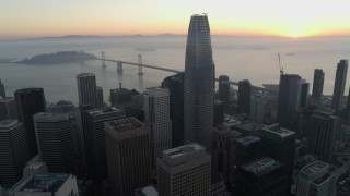 PP0002_000054 - 5.7K stock footage aerial video slowly passing Salesforce Tower and skyscrapers at sunrise in Downtown San Francisco, California