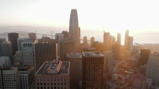 PP0002_000076 - 5.7K stock footage aerial video pan from fog over Civic Center, across South of Market, reveal Salesforce Tower at sunrise, Downtown San Francisco, California