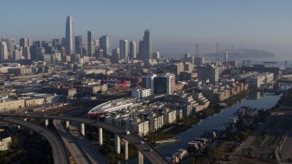 PP0002_000095 - 5.7K stock footage aerial video of waterfront condo complexes and the city's skyline, Downtown San Francisco, California