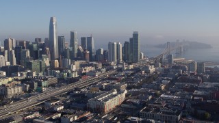 PP0002_000101 - 5.7K stock footage aerial video stationary view of I-80 to Bay Bridge near skyline, Downtown San Francisco, California