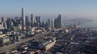 PP0002_000102 - 5.7K stock footage aerial video stationary view of I-80 freeway to Bay Bridge near skyline, Downtown San Francisco, California