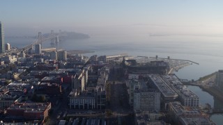 PP0002_000105 - 5.7K stock footage aerial video pan from AT&T Park to reveal I-80 freeway and Bay Bridge near skyline, Downtown San Francisco, California