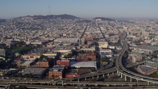 PP0002_000112 - 5.7K stock footage aerial video view across the expanse of the city from freeway interchange, South of Market, San Francisco, California