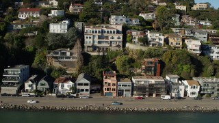 PP0002_000125 - 5.7K stock footage aerial video slowly pass waterfront homes on a hill by Richardson Bay in Sausalito, California