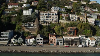 PP0002_000126 - 5.7K stock footage aerial video slowly flying by waterfront homes on a hill by Richardson Bay in Sausalito, California