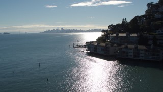 PP0002_000133 - 5.7K stock footage aerial video a view of the San Francisco skyline during decent, pan to condos in Sausalito, California