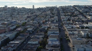 PP0002_000153 - 5.7K stock footage aerial video reverse view of quiet city street lined with apartment buildings in the Marina District, San Francisco, California