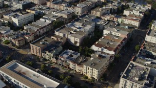 PP0002_000163 - 5.7K stock footage aerial video approach row of apartment buildings and tilt to bird's eye view, Marina District, San Francisco, California