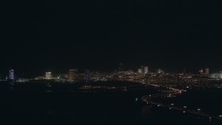PP003_004 - HD stock footage aerial video of flying toward hotels and casinos in the Atlantic City skyline at night, New Jersey