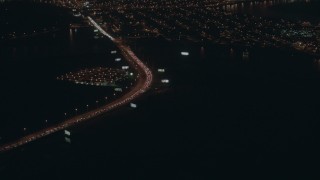PP003_007 - HD stock footage aerial video of heavy traffic on a city street at night, Atlantic City, New Jersey