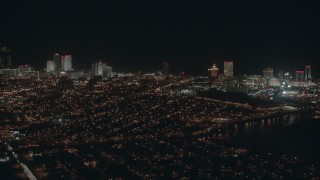 PP003_009 - HD stock footage aerial video of panning across hotels and casinos at night in Atlantic City, New Jersey