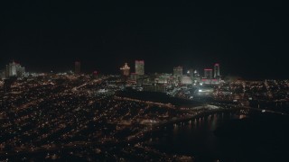 PP003_010 - HD stock footage aerial video of flying by hotels and casinos at night in Atlantic City, New Jersey