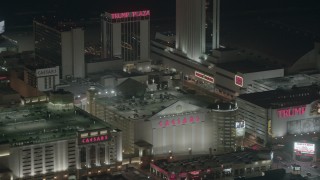PP003_014 - HD stock footage aerial video of the front sides of famous hotels and casinos at night, Atlantic City, New Jersey
