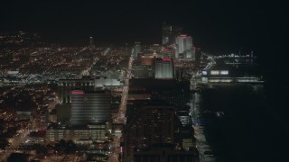 PP003_017 - HD stock footage aerial video of flying by hotels and casinos on the shore at night Atlantic City, New Jersey