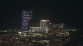 PP003_023 - HD stock footage aerial video of flying by casinos and hotels at night in Atlantic City, New Jersey