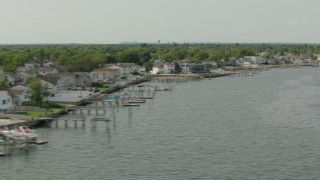PP003_045 - HD stock footage aerial video of waterfront homes on the shore of a bay in Merrick, New York