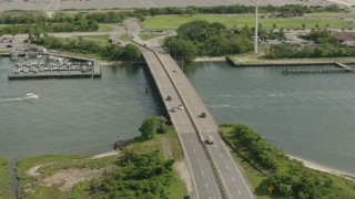 PP003_050 - HD stock footage aerial video flyby bridge spanning a river in Point Lookout, New York