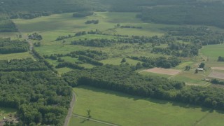 PP003_059 - HD stock footage aerial video of flying over farms and green fields, Jackson, New Jersey