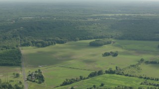 PP003_060 - HD stock footage aerial video of a rural landscape of farm fields in Jackson, New Jersey