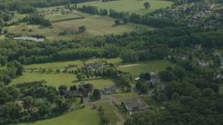 PP003_062 - HD stock footage aerial video approach rural homes in Jackson, New Jersey