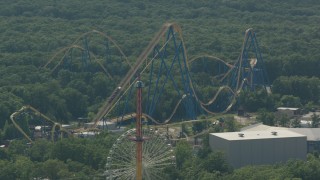PP003_071 - HD stock footage aerial video orbit ride to reveal roller coaster at Six Flags Great Adventure theme park in Jackson, New Jersey